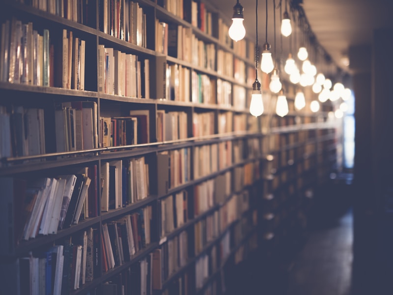 Historical books representing the journey of IECC